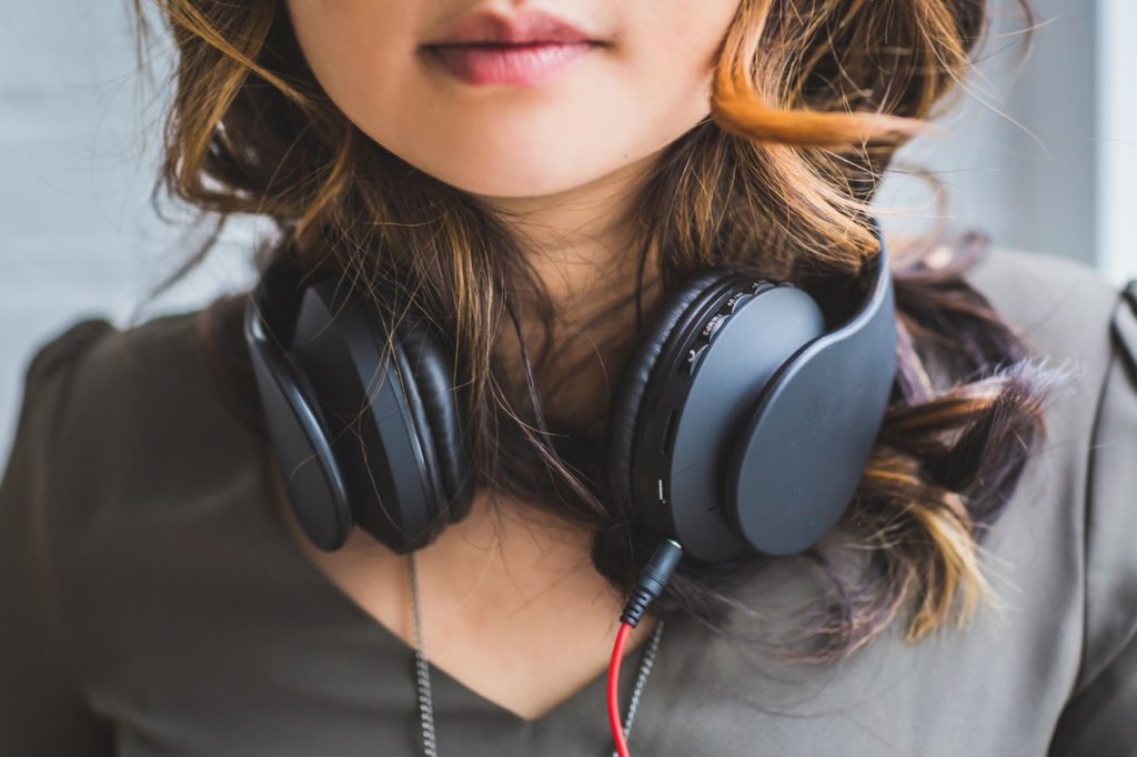 What are the advantages of using wireless headphones over wired headphones?
